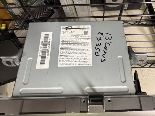 Lexus ES350 86130-33012 head unit OEM label showing the part number, Fujitsu Ten manufacturer markings, and made-in-Japan stamp