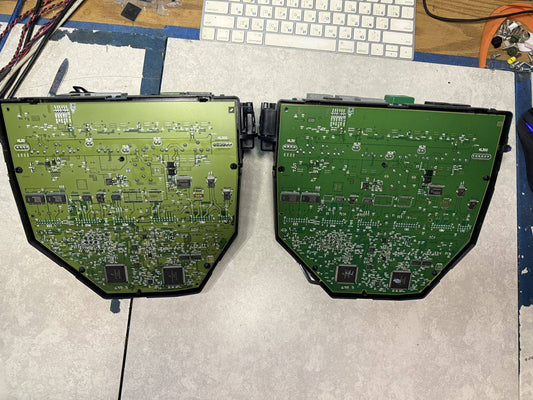 Two Mercedes W204 Front SAM modules side by side on a workbench for board comparison, West Palm Beach