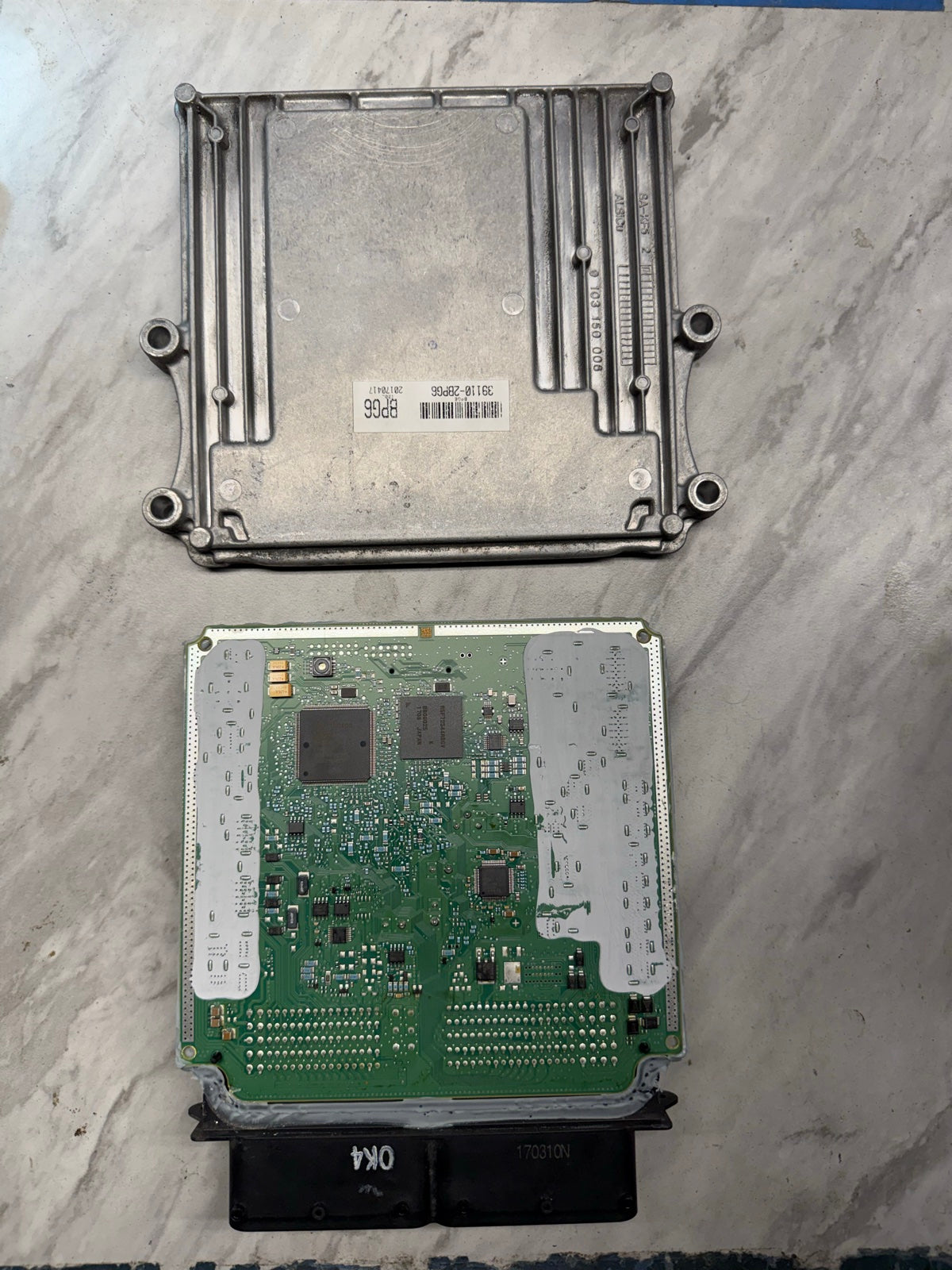 Kia Soul ECU CPGDSH2.26.1 open case showing PCB — Delray Beach Kia ECU service